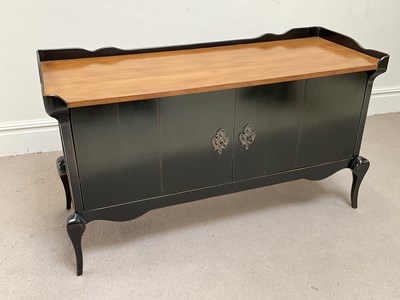 Lot 37 - A modern black painted walnut sideboard, with...