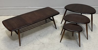 Lot 12 - ERCOL; a nest of dark elm and beech pebble...