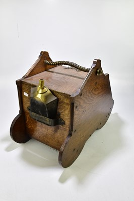 Lot 2467 - A Victorian brass bound oak coal box.