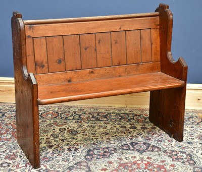 Lot 1588 - A pitch pine pew, width 108cm.
