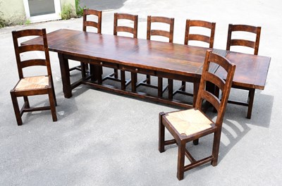 Lot 1695 - A reproduction French dark oak refectory...