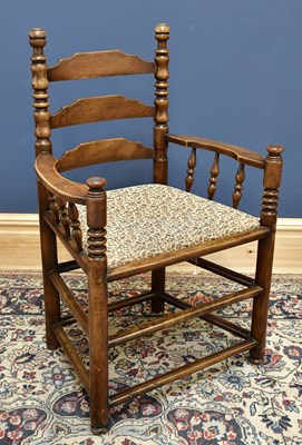 Lot 1590 - An 18th century elm country elbow chair on...