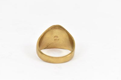 Lot 605 - A yellow metal gents ring, stamped 18k size V,...