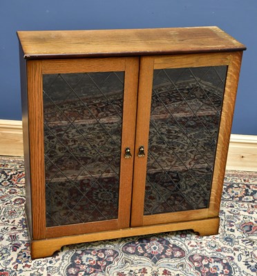 Lot 1724 - A 20th century two door astragal glazed...