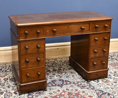 Lot 1564 - A Victorian mahogany pedestal desk with nine...