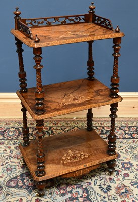 Lot 1644 - A Victorian inlaid walnut three tier whatnot,...