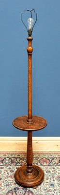 Lot 1674 - An oak turned standard lamp, height approx 152cm.