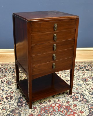 Lot 1622 - An Art Deco mahogany five drawer music cabinet...