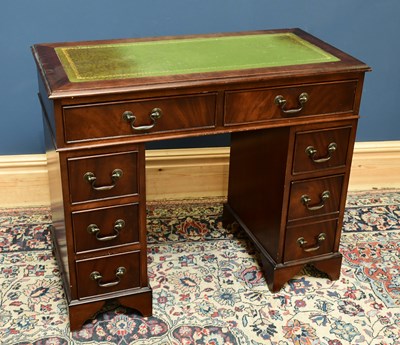 Lot 1721 - A reproduction mahogany pedestal desk of small...
