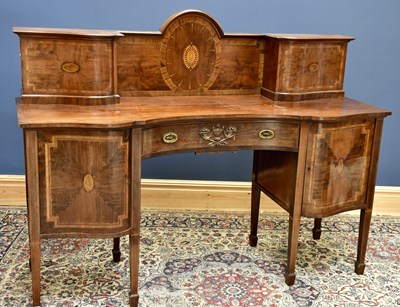 Lot 1557 - An Edwardian inlaid mahogany serpentine...
