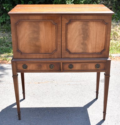 Lot 1720 - A reproduction mahogany cocktail cabinet, with...