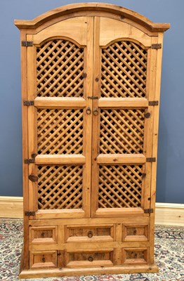 Lot 1665 - An Indian style pine cupboard, height 196cm,...
