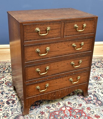 Lot 1713 - A small reproduction chest of two short over...