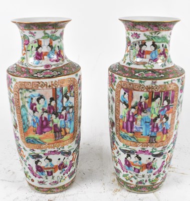 Lot 490 - A pair of Canton Famille Rose vases with...