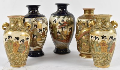 Lot 516 - A Japanese late Meiji period 'Thousand Faces'...