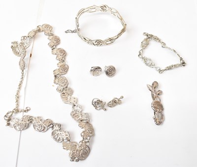 Lot 653 - A collection of silver jewellery after designs...