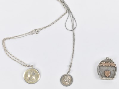Lot 688 - Two silver necklaces with pendants, also a...