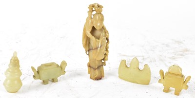 Lot 538 - Four Chinese green hardstone objects, possibly...