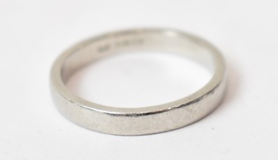 Lot 650 - A 950 platinum wedding band, size L/M, 4.5g....