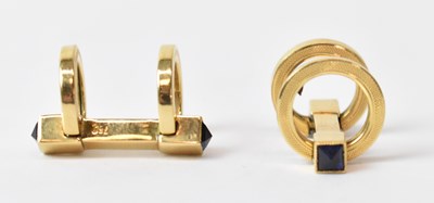 Lot 613 - A pair of 18ct yellow gold cufflinks set with...