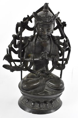 Lot 502 - A Chinese bronze figure of a seated Buddha,...