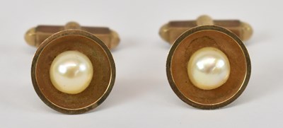 Lot 659 - A pair of 9ct yellow gold pearl set cufflinks,...