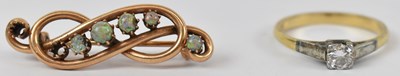 Lot 638 - A 15ct yellow gold brooch set with five opals...