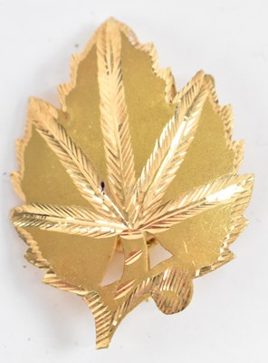 Lot 625 - An Indian yellow metal maple leaf brooch,...