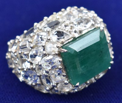 Lot 597 - A very large Indian white sapphire and emerald...