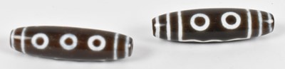 Lot 609 - Two Tibetan old agate eye motif dzi beads,...
