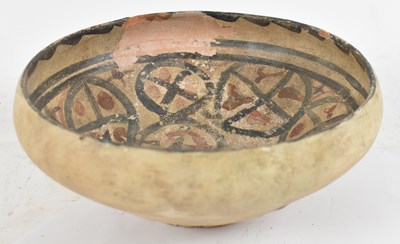 Lot 488 - An ancient painted earthenware footed bowl,...
