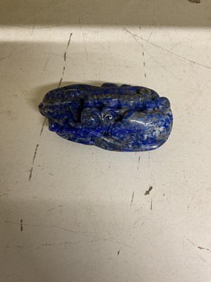 Lot 495 - A Chinese lapis lazuli boulder carving, 8 x 4cm.