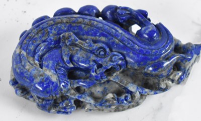 Lot 496 - A Chinese lapis lazuli carving of a dragon, 7...