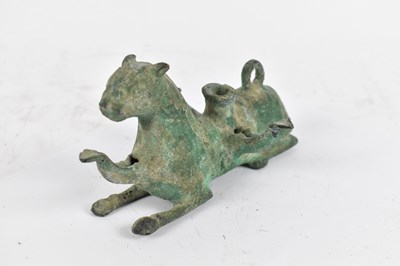 Lot 492 - A Chinese verdigris bronze candlestick...