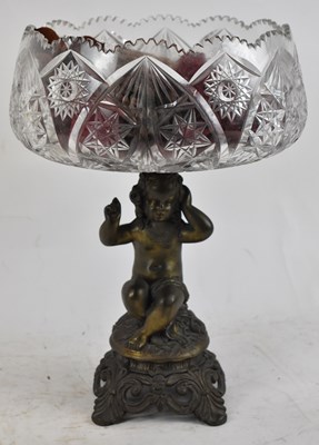 Lot 482 - A cut glass bowl on gilt metal cherub stand,...