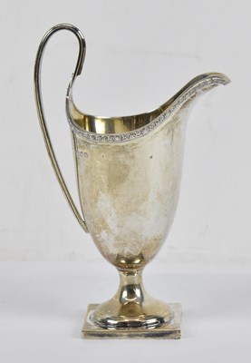 Lot 570 - A modern hallmarked silver cream jug, London...