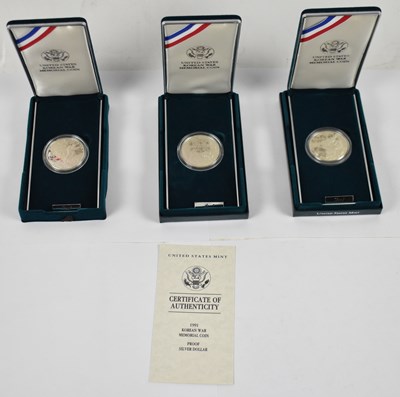 Lot 706 - Three Korean War Memorial $1 silver coins.