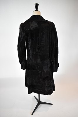Lot 30 - A dark brown full length fur coat, size 36.