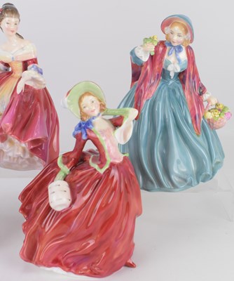 Lot 354 - ROYAL DOULTON; four porcelain figures...