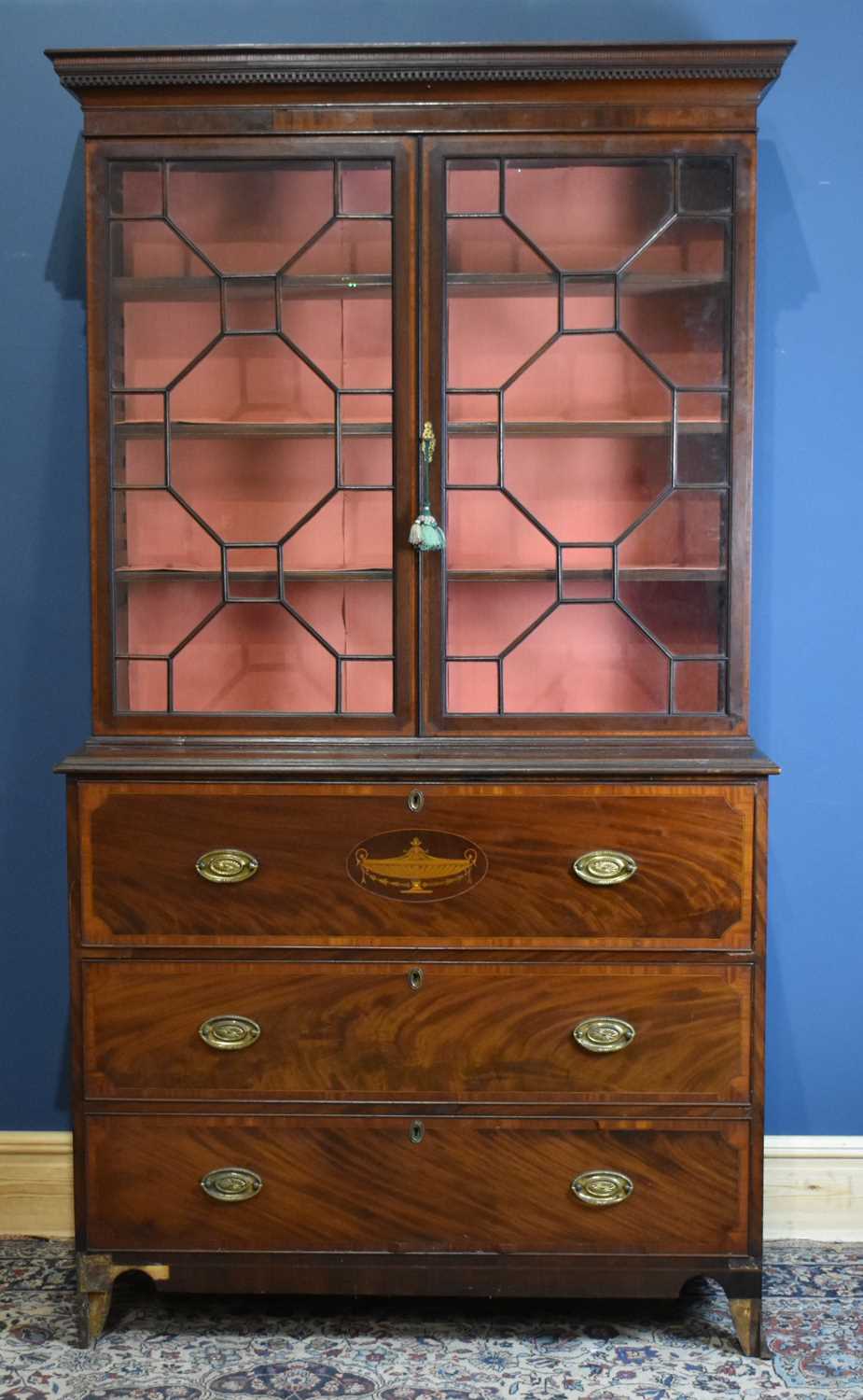 Lot 1 - An early 19th century inlaid mahogany...