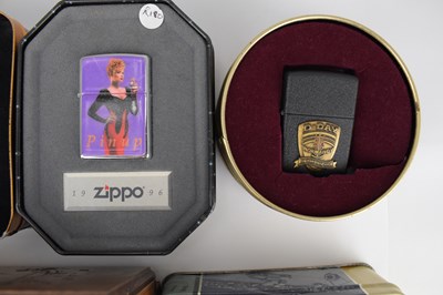 Lot 185 - ZIPPO; seven collectors' edition lighters,...