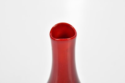 Lot 61 - ROYAL DOULTON; a veined flambe baluster shaped...