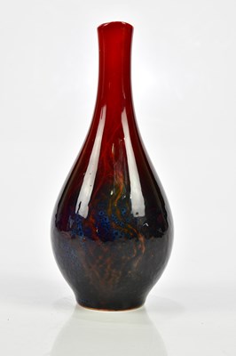 Lot 61 - ROYAL DOULTON; a veined flambe baluster shaped...