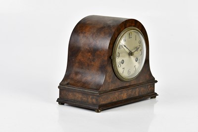 Lot 2143 - A 1930s walnut mantel clock with silvered dial...