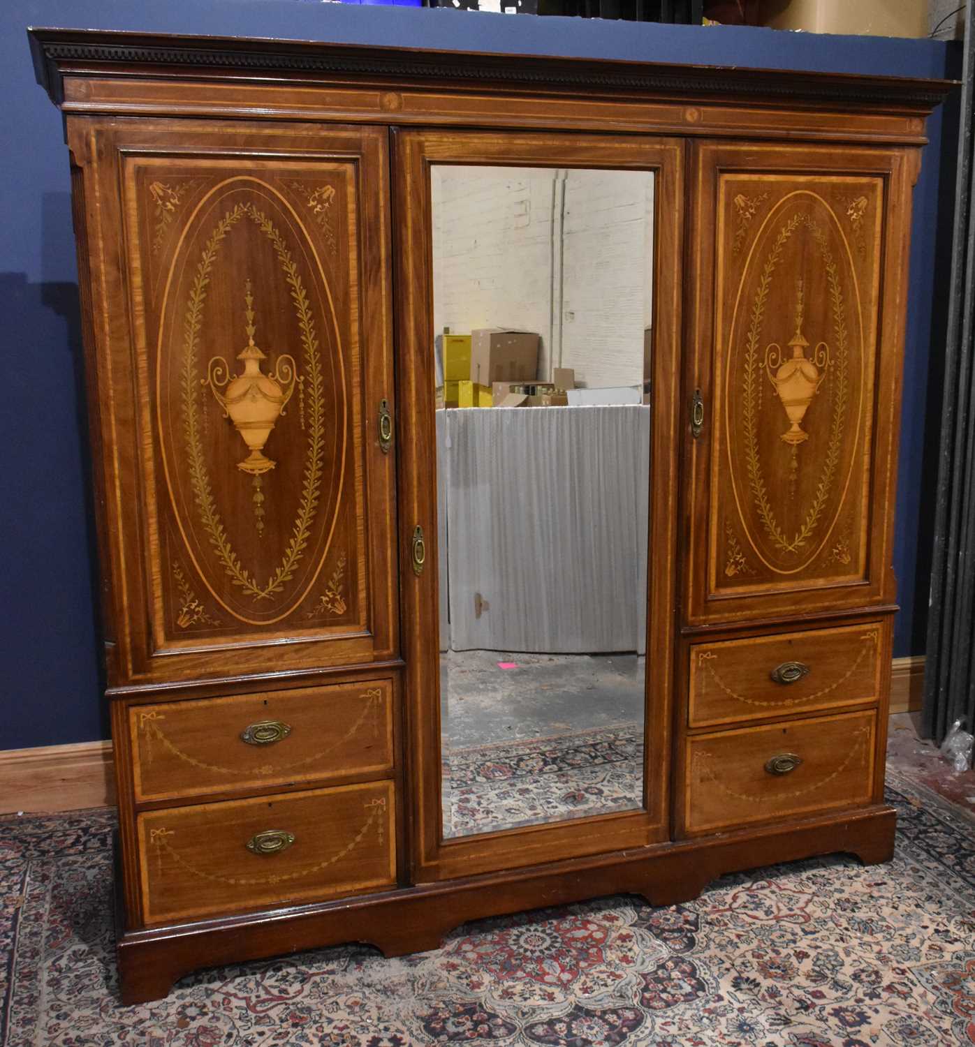 Lot 4 - An Edwardian Sheraton revival inlaid mahogany...