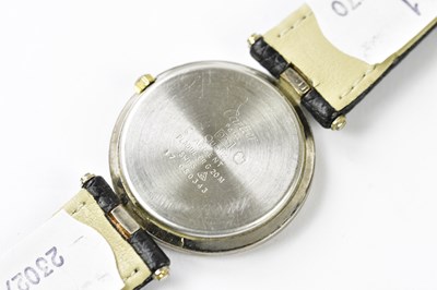 Lot 1219 - MUST DE CARTIER; a gentleman's silver cased...