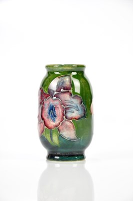 Lot 1283 - WALTER MOORCROFT; a miniature vase in the...