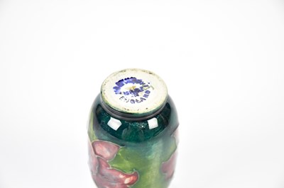 Lot 1283 - WALTER MOORCROFT; a miniature vase in the...