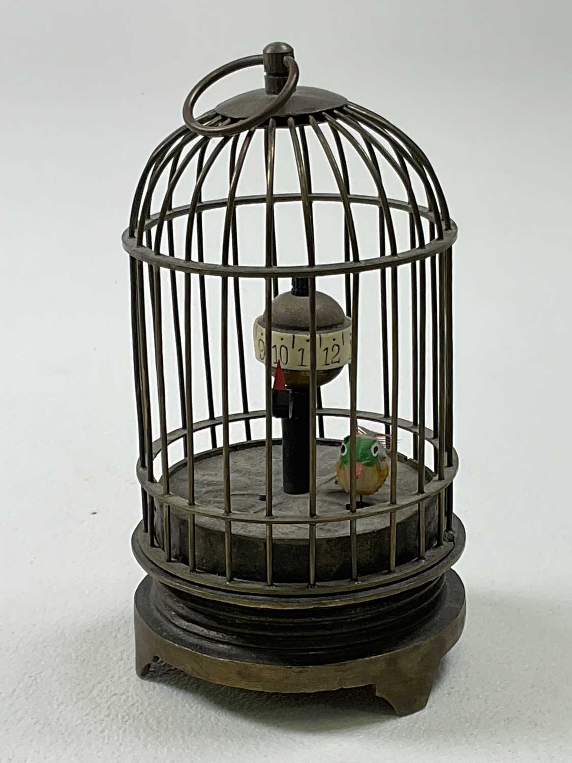 Lot 44 - An early 20th century novelty single bird...
