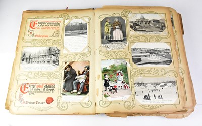 Lot 551 - A postcard album containing black and white...